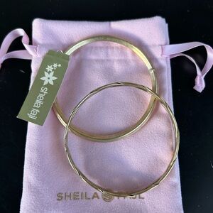 Sheila Fajl bangles gold plated never worn. Photos in silver showing the shape.